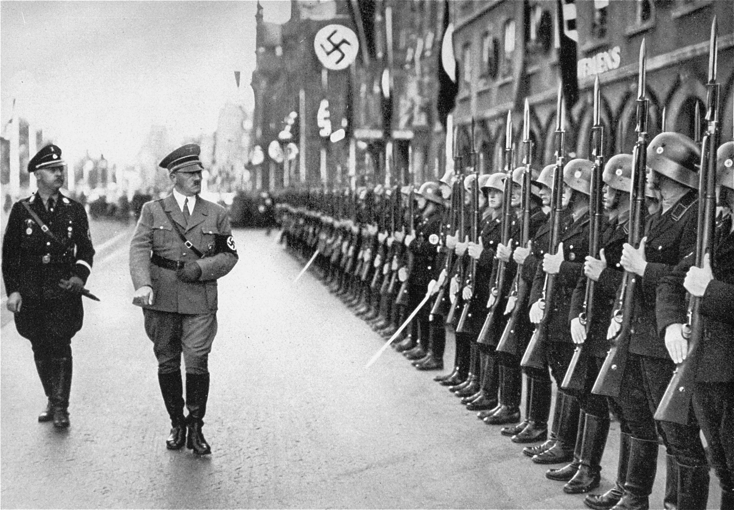 Adolf Hitler and SS Chief Heinrich Himmler review the SS at a Reichsparteitag (Reich Party Day) ceremony in Nuremberg, Germany, September 1935. Photo credit: USHMM #11775