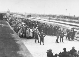 Jews from Subcarpathian Rus await selection on the ramp at the Auschwitz-Birkenau extermination camp in Nazi-occupied Poland, May 1944. Photo credit: USHMM #77319