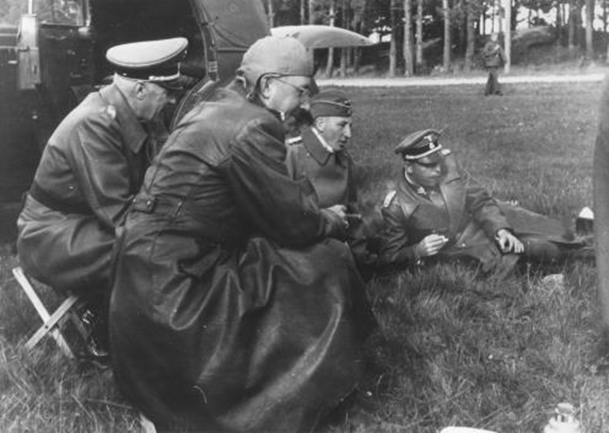 Nazi SS leaders Heinrich Himmler (front) and Reinhard Heydrich (center rear) during a trip to Estonia. Photo credit: USHMM #60454