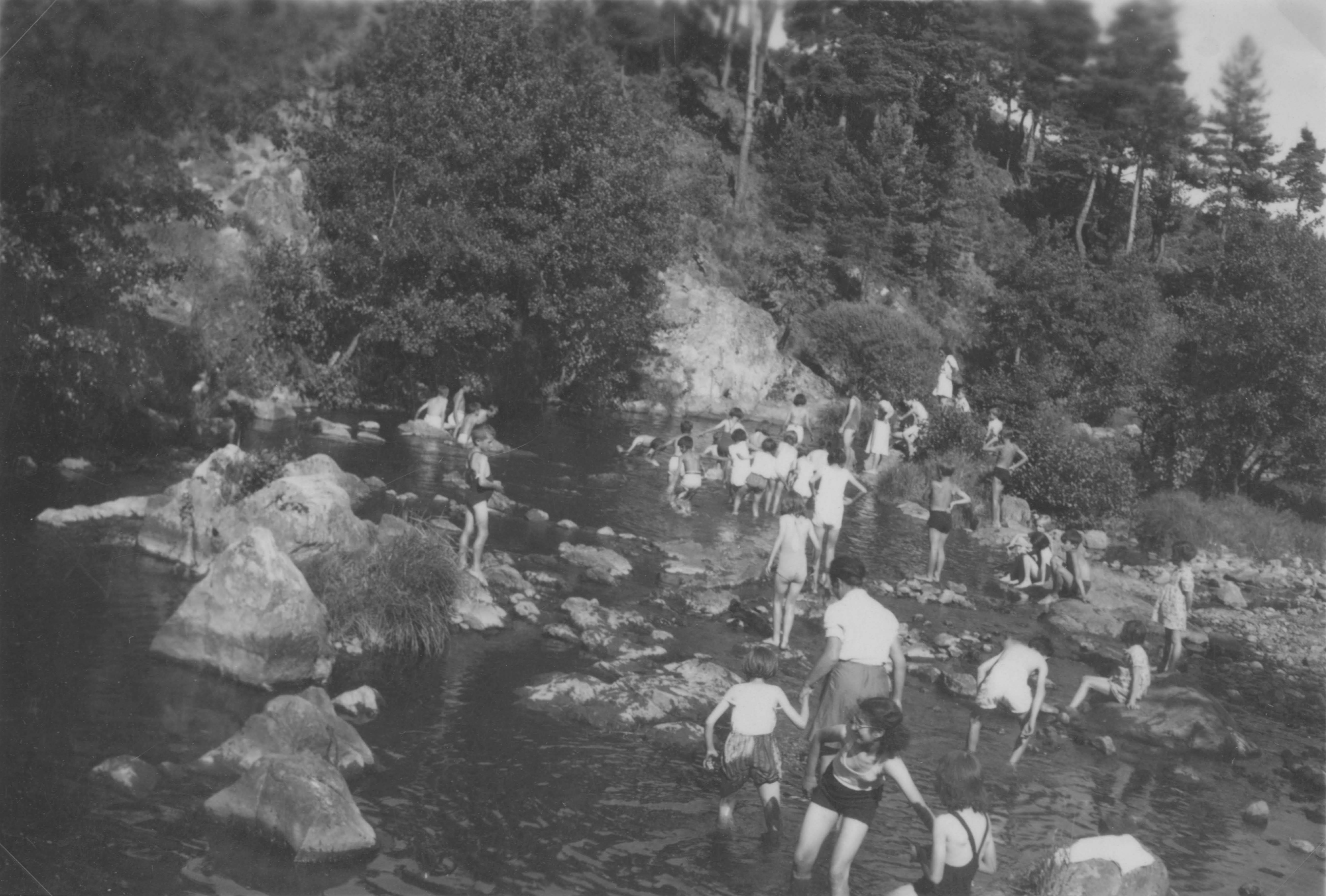 Refugees swimming in the Lignon River