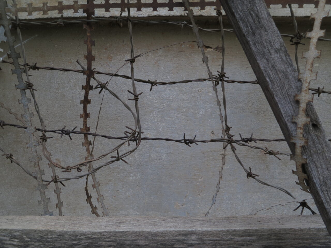 Image of barbed wire at the Tuol Sleng Genocide Museum in Phnom Penh, Cambodia, 2019