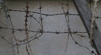 Image of barbed wire at the Tuol Sleng Genocide Museum in Phnom Penh, Cambodia, 2019