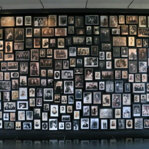 Image of a collection of victims' photos at the Auschwitz-Birkenau Museum and Memorial, 2017.