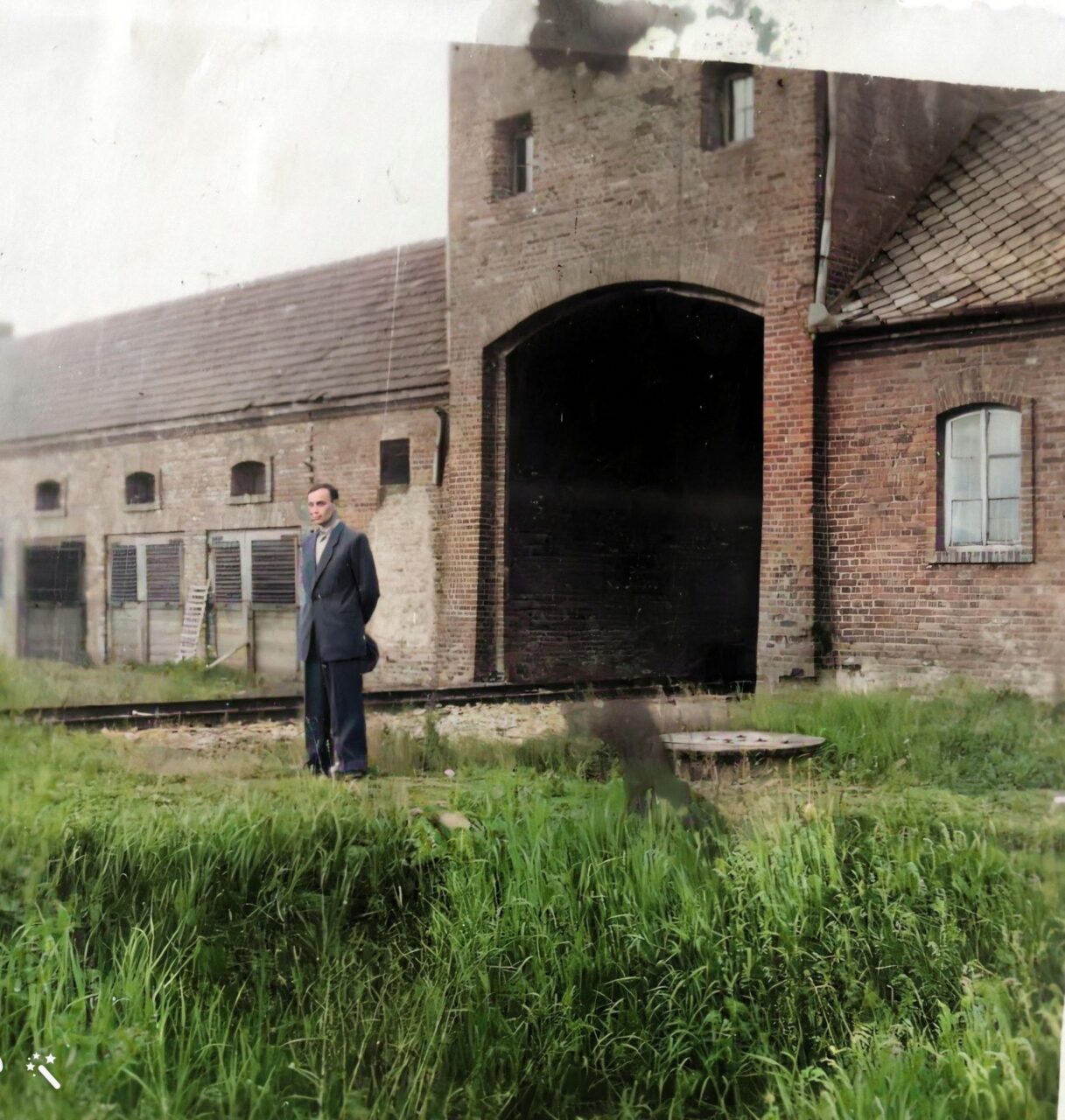 Image of Salomon Kupperman, a Holocaust survivor, in front of the gate of death in Birkenau in the late 1940’s. Photo courtesy of Elina Shaked